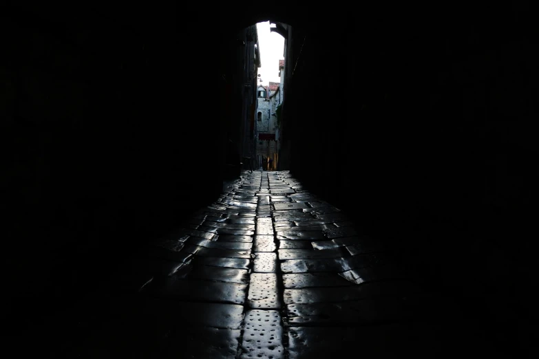 a very dark alley in a small town