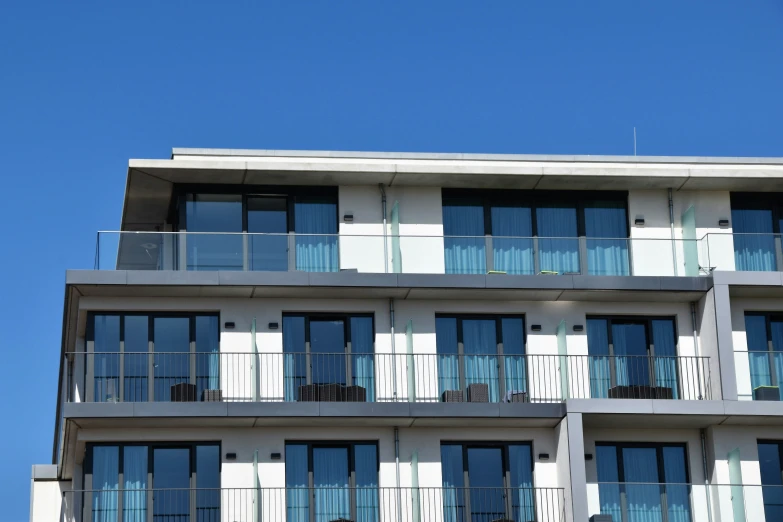 a building with balconies and balconies on each of it's balconies