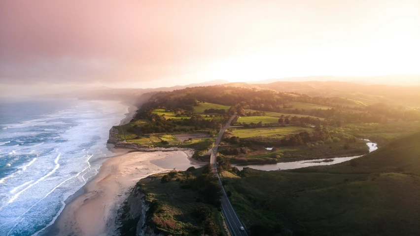 an aerial view of the coast on a cloudy day