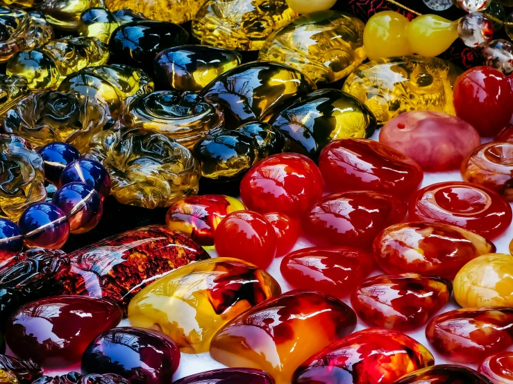many colorful, jelly like objects are on display
