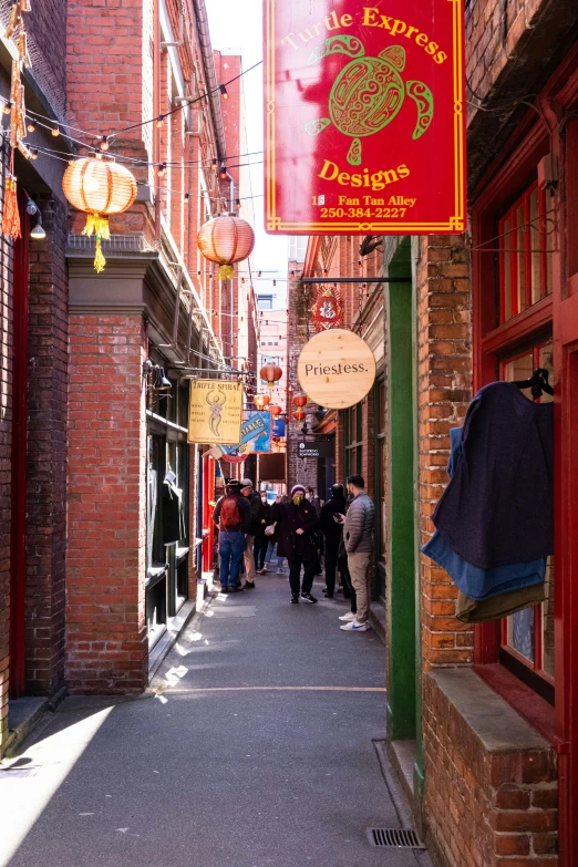 an alleyway that has people walking on it