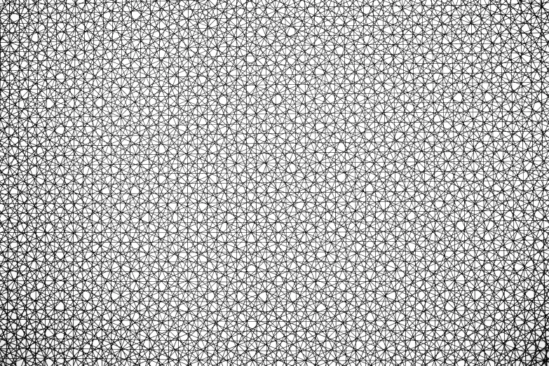 the back and top half of a pattern of circles in white