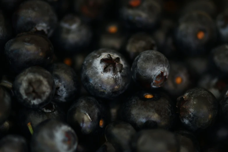 a lot of blueberries that are sitting on the table