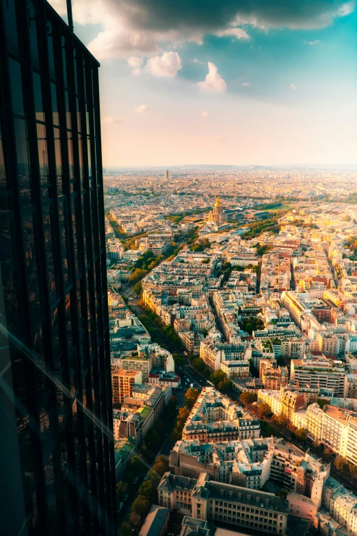 the view from the top of a building looking down on paris