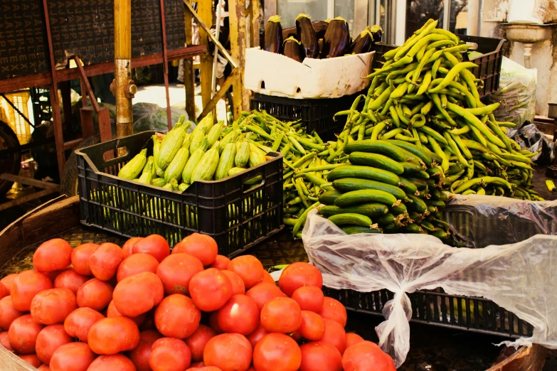 fruit sits in baskets on the ground