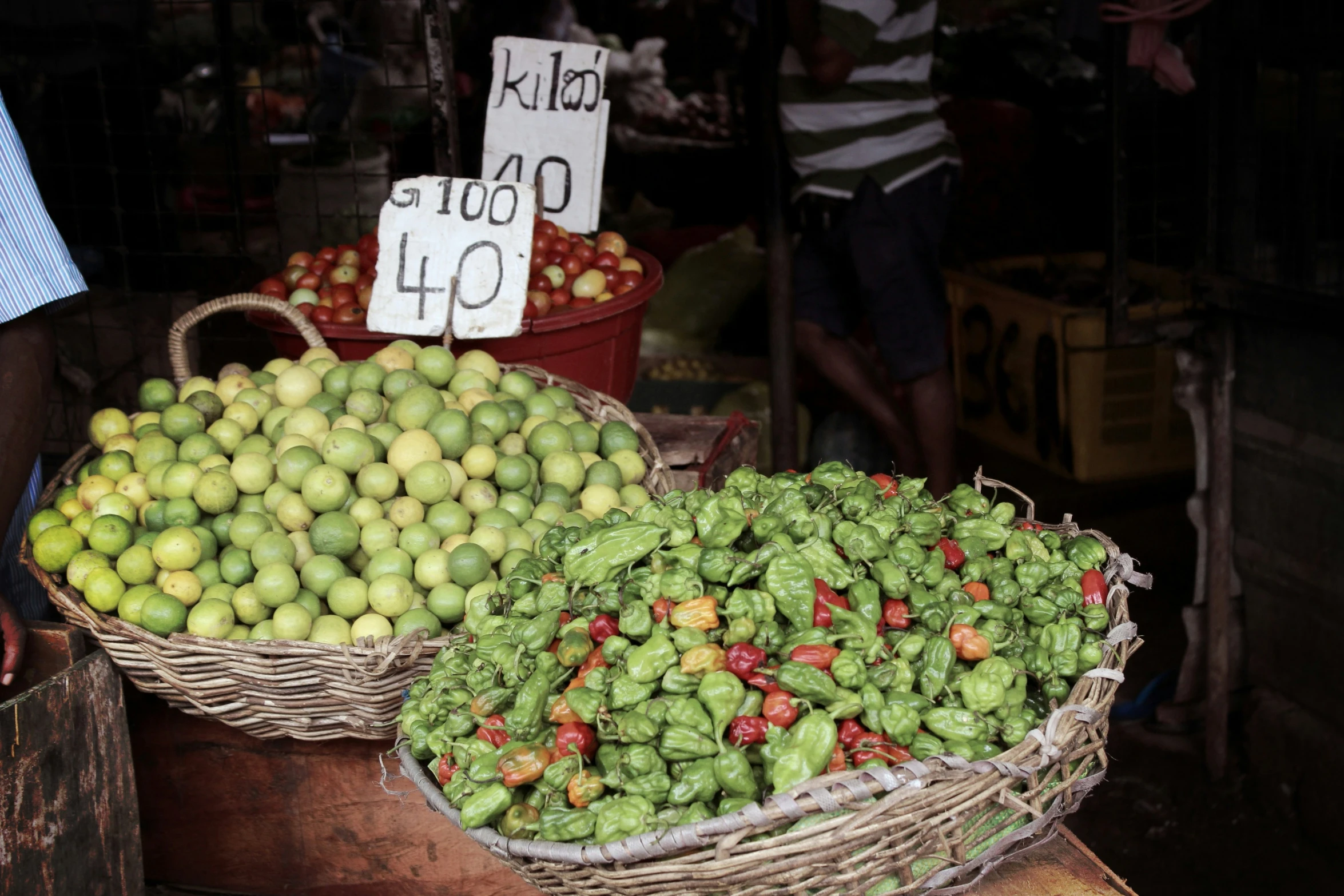 two baskets of limes that have been grown for sale