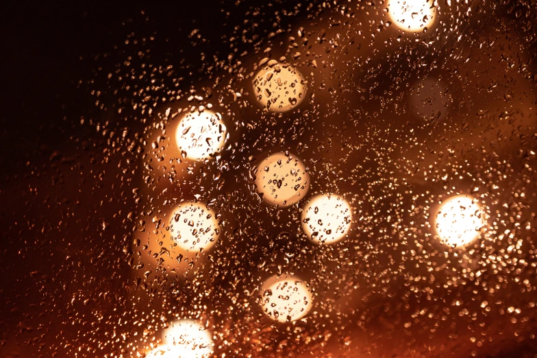 a close up of the raindrops on a window