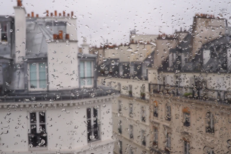 a picture outside of a window on a rainy day