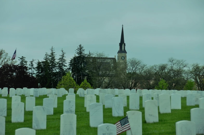 the cemetery in the cemetery, with a tower in the distance