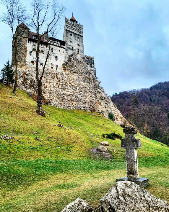 an old castle on top of a mountain