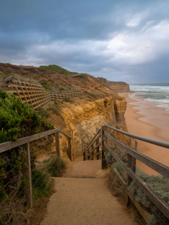 the path going down to the beach is next to the cliff