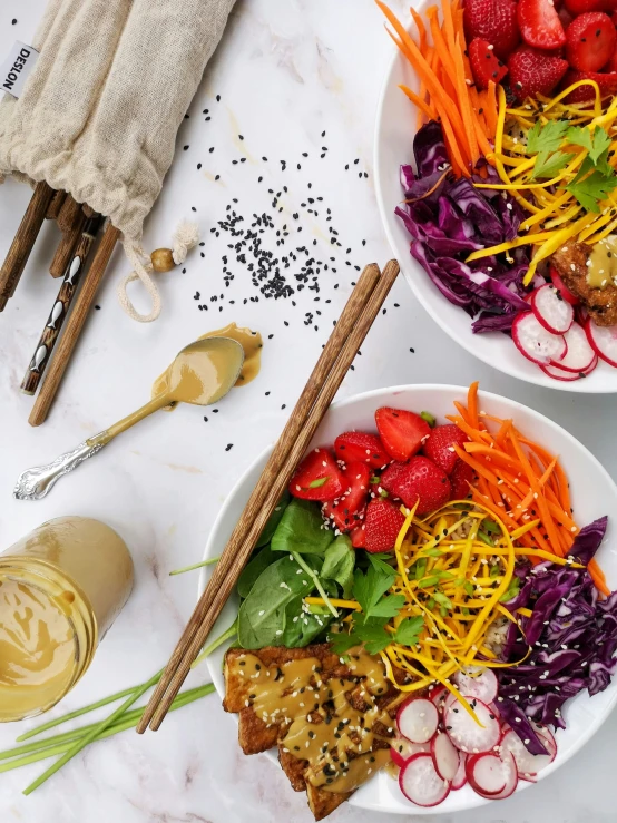 two bowls filled with different foods and ingredients