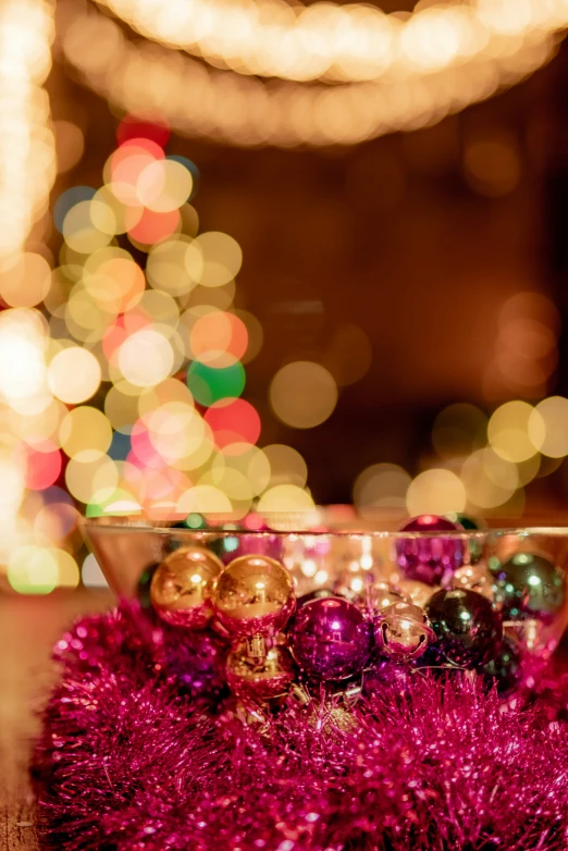 a pile of small christmas ornament sitting on top of a table