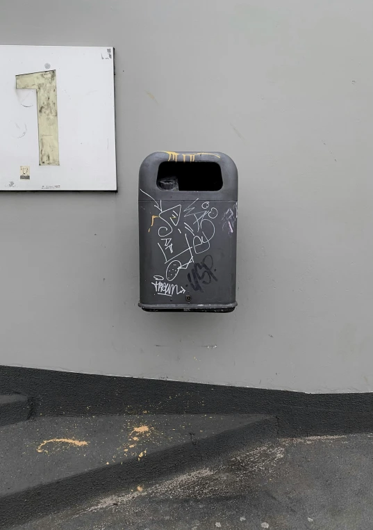 a mailbox with a city map on it and a white background