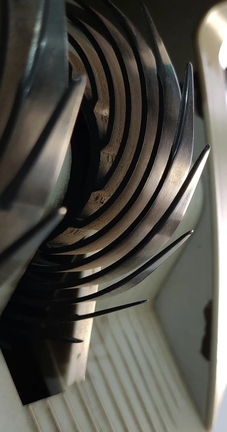 a close up of metal plates on a table