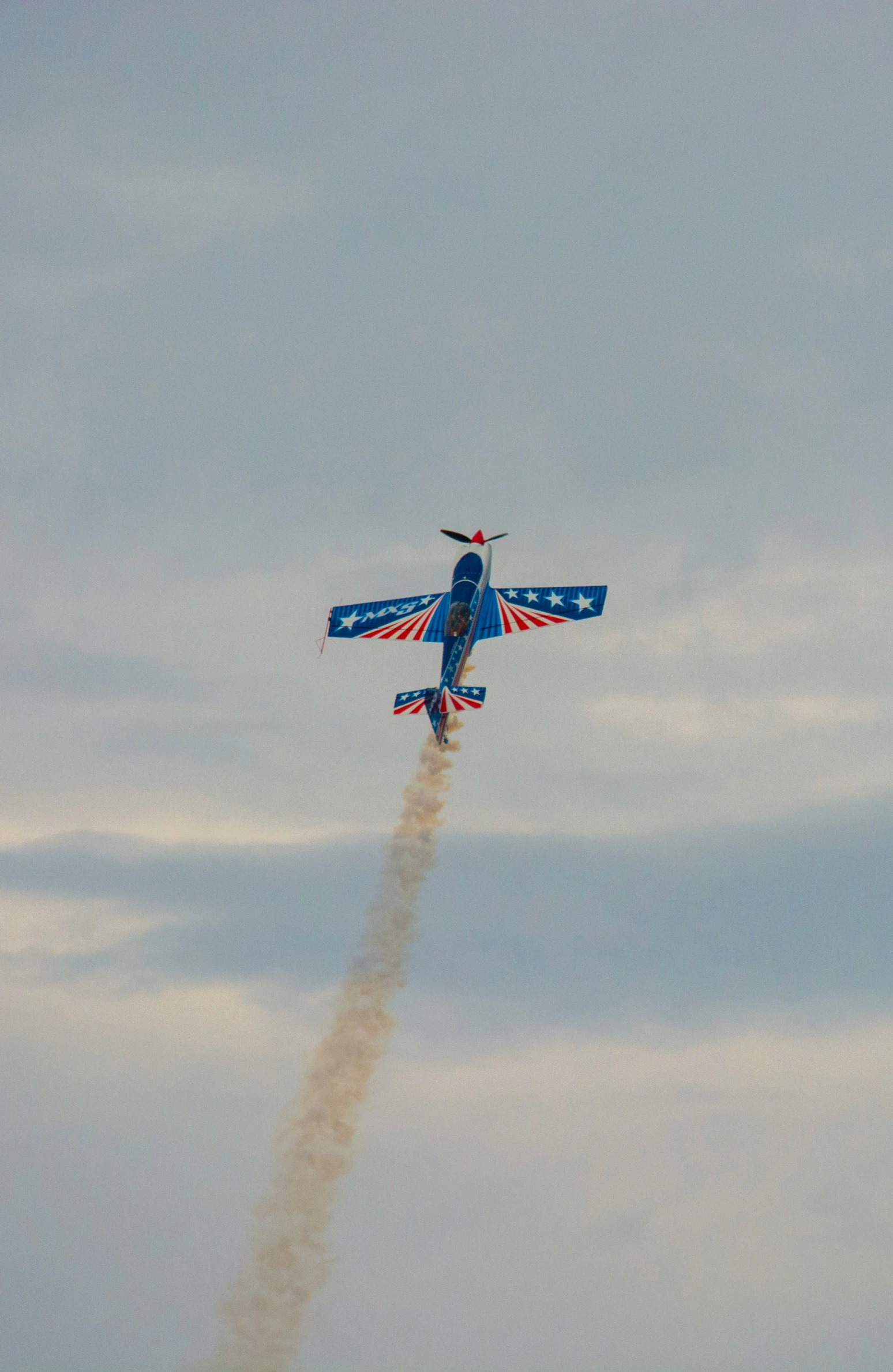 an air plane flying up in the sky