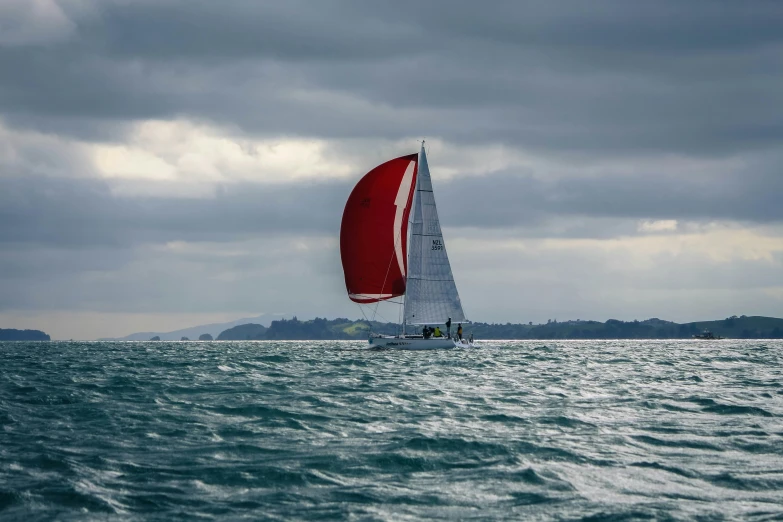 sailboat out on the sea in the open wind