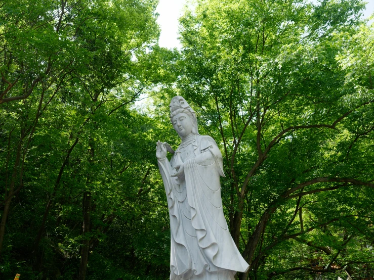 a statue of a person with a veil around their head