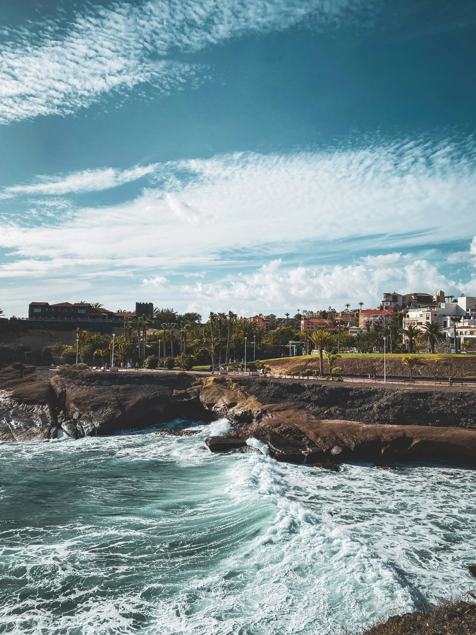 a cliff that looks to be very low lying and has a bunch of waves