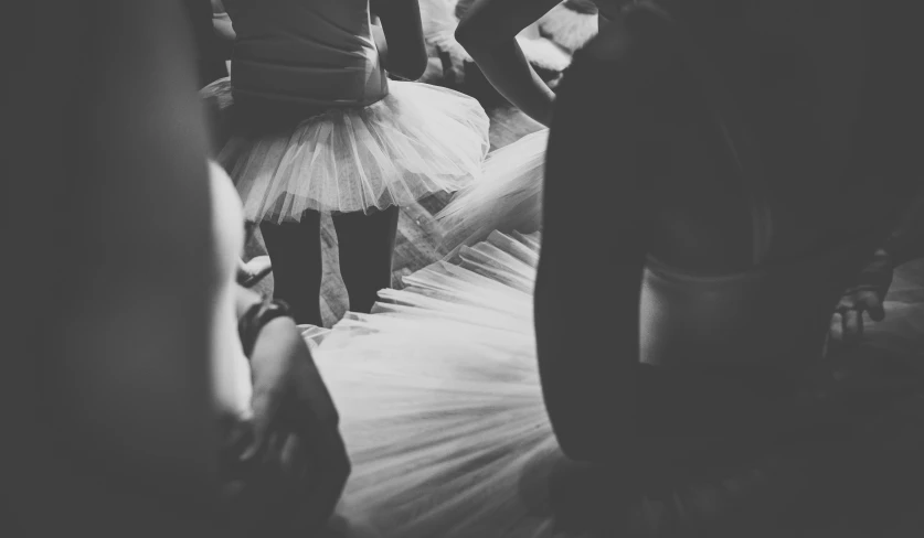 a black and white po of a person in a ballerina