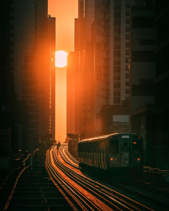 the sun is setting behind some large tall buildings