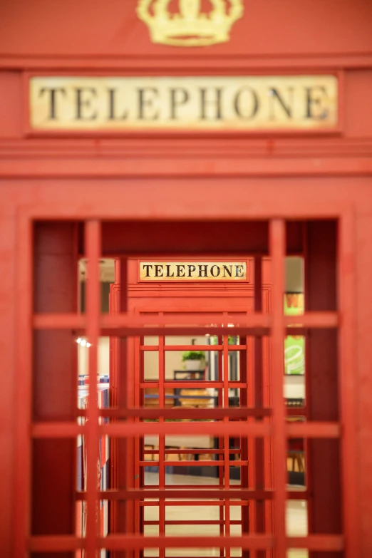 the front entrance to the telephone booth in england