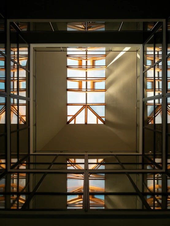 light shines on the ceiling and light coming through it