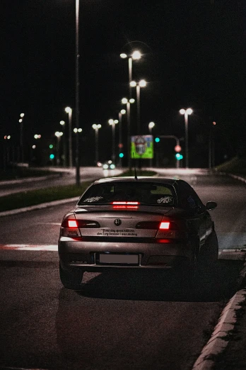 a car at an empty street at night