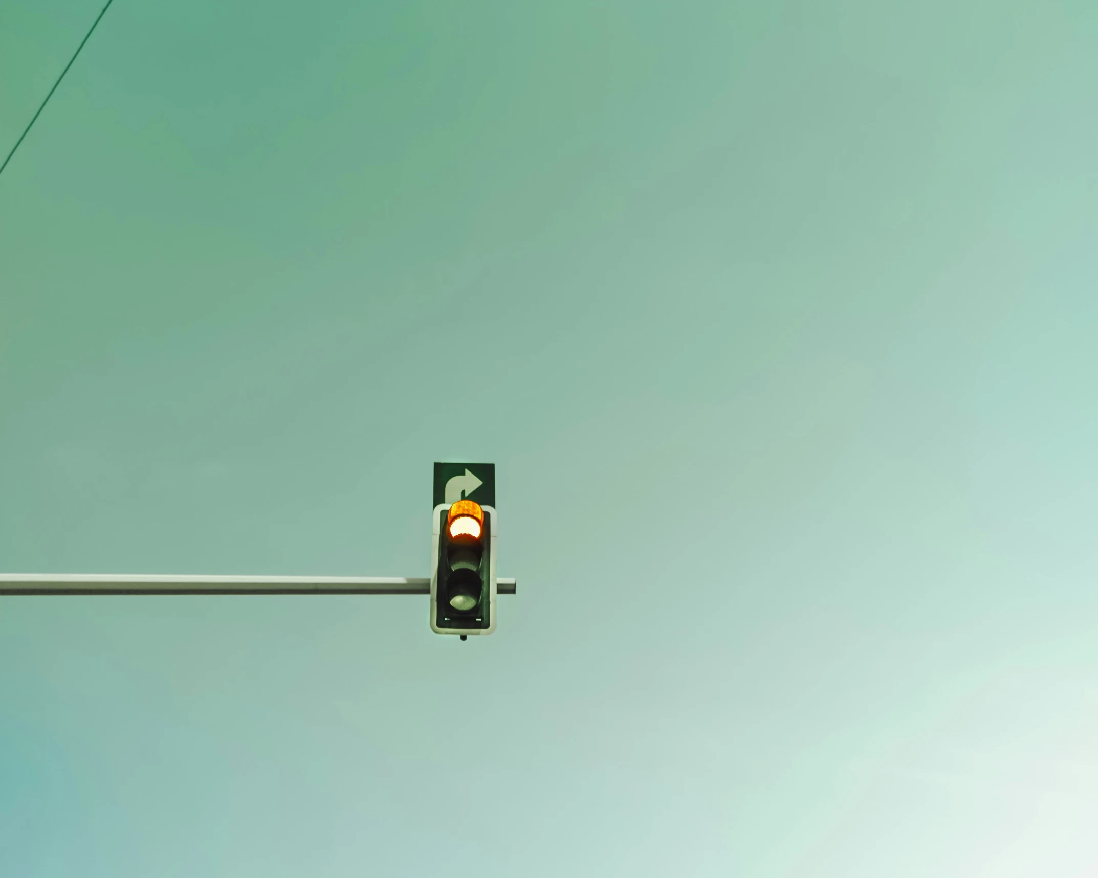 the stop light is green, so there is a stop signal at the end