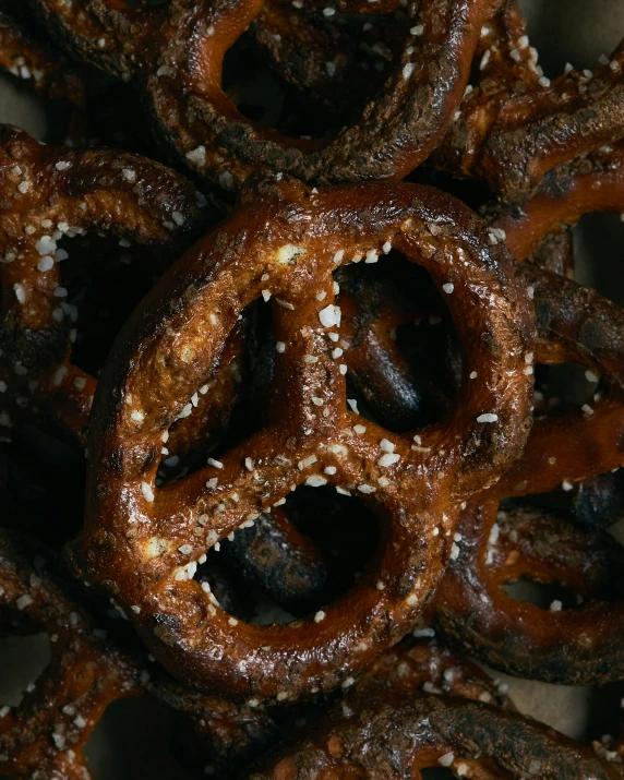 a large amount of pretzels and grain on a plate