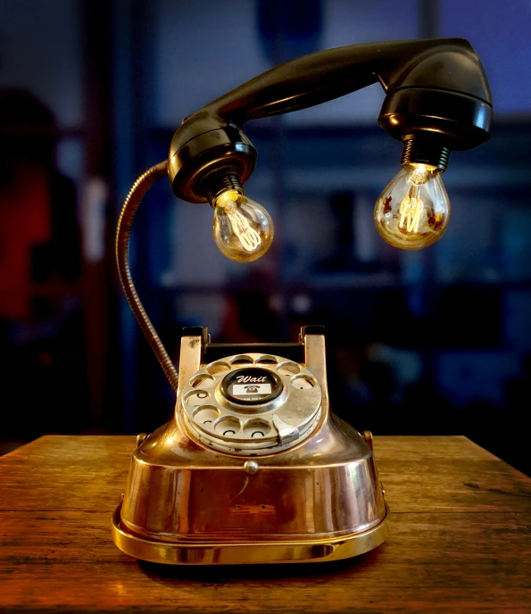 an old - fashioned rotary rotary telephone on a table