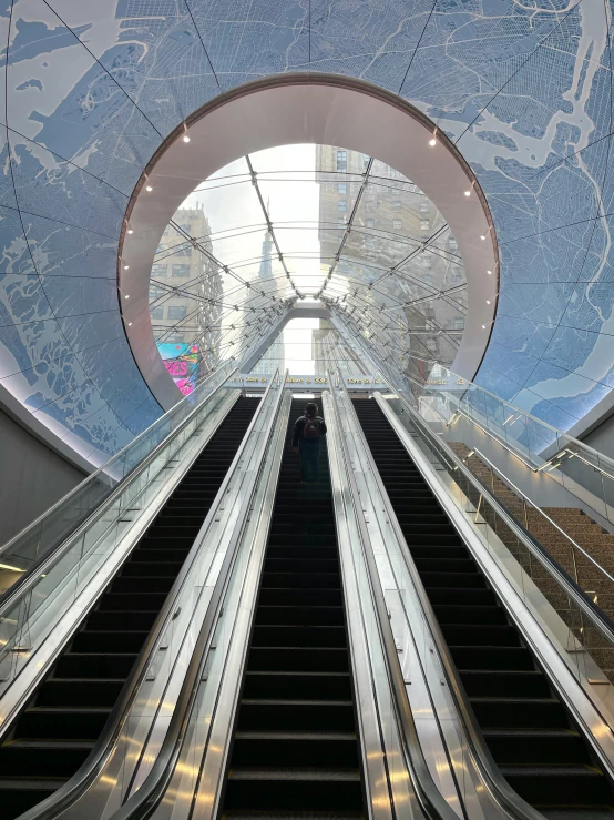 a escalator with several escalators going up the hill