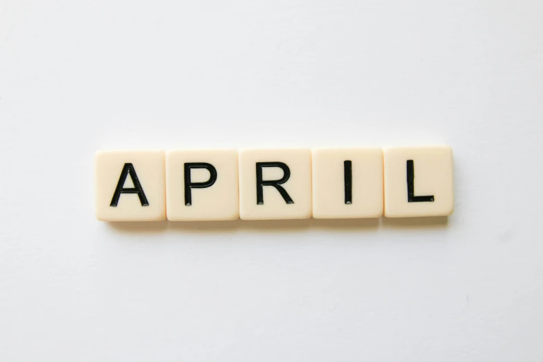 the word april spelled in small letters in scrabble type