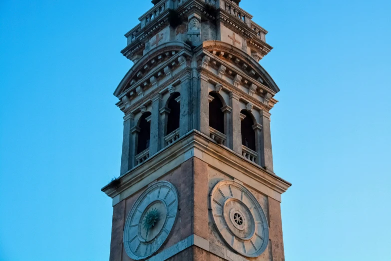 the clock is built into the side of a building