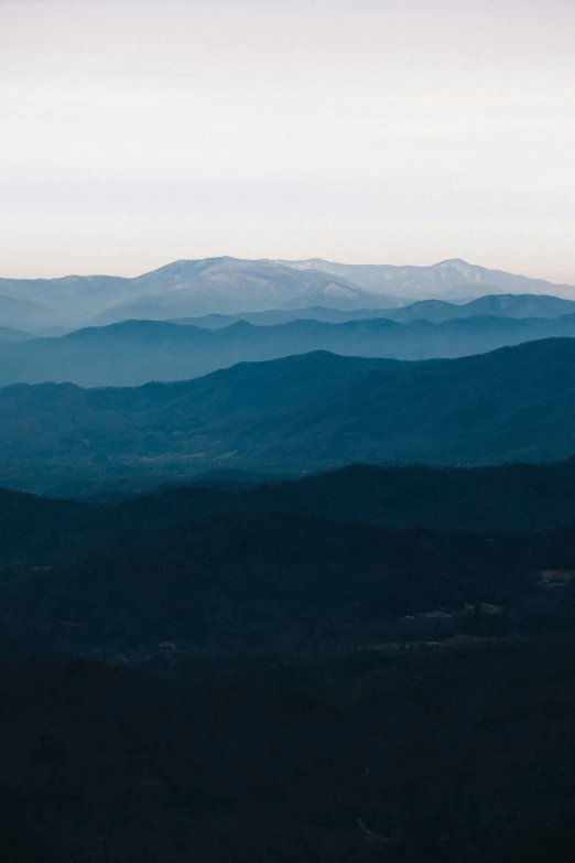 the view of a distant mountain range from a plane