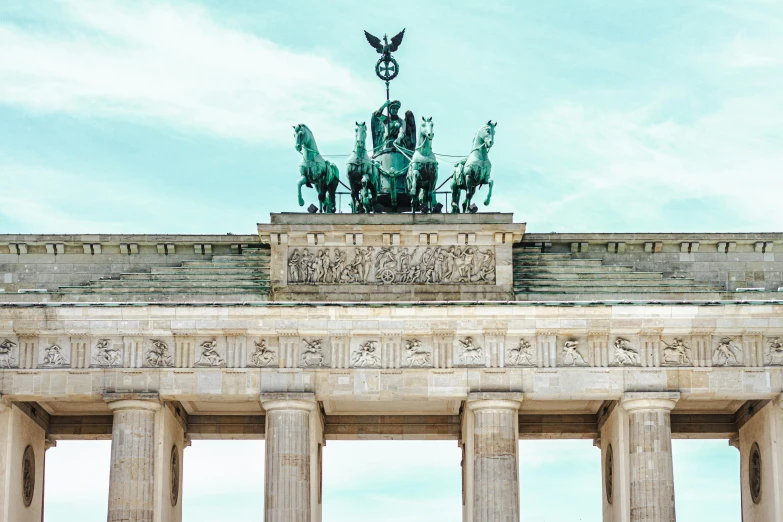 a monument with many statues on top of it