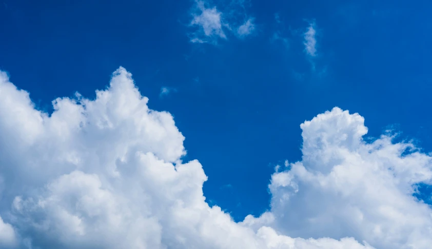 the clouds are very blue in a sunny day