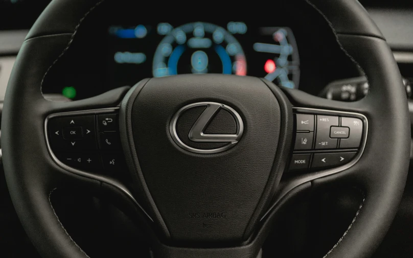 a steering wheel, dashboard and instrument in a vehicle