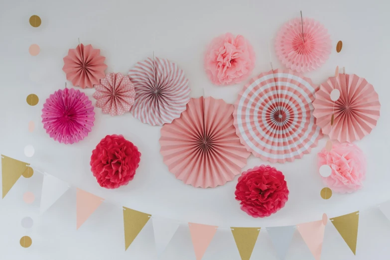 paper fans and decorations for a birthday party