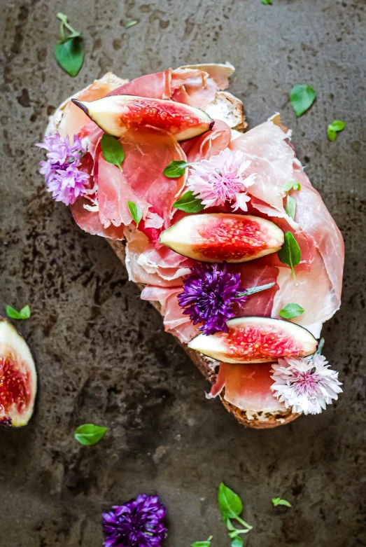 fresh fruit salad with anchovies and wildflowers