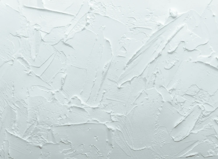 the texture of white paint that is peeling