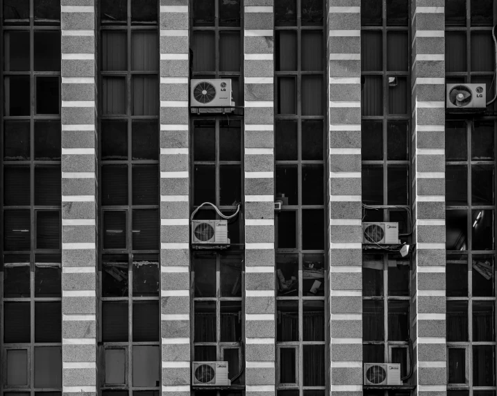 a building with windows and some signs in the window