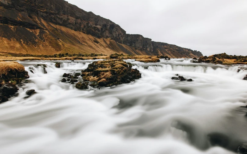 water running over a river in the mountains