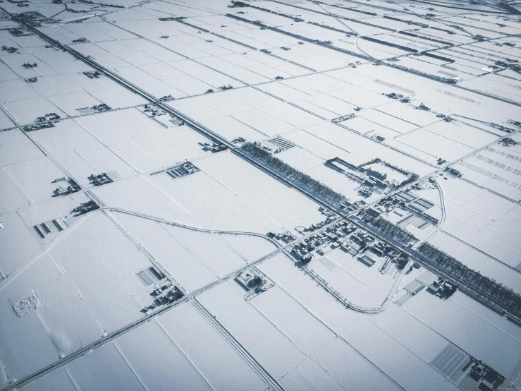 an aerial view of the airport in winter