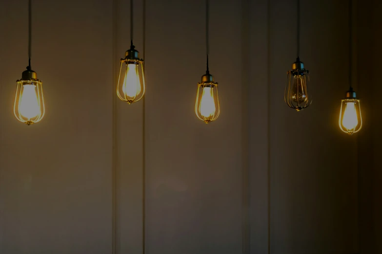 a collection of different style light bulbs on the ceiling