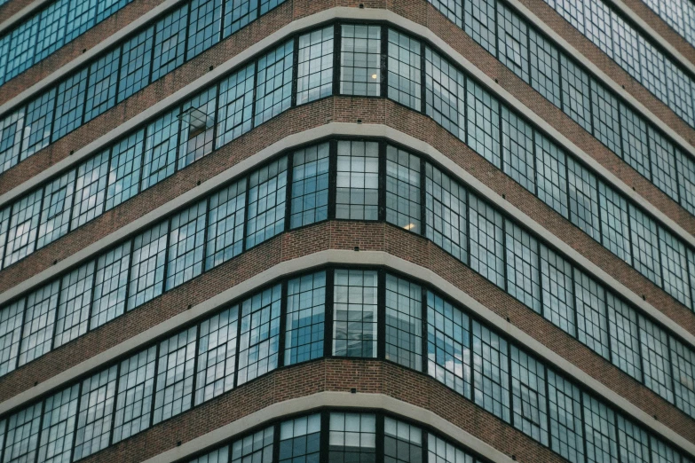 a close up view of the windows and side of an apartment building