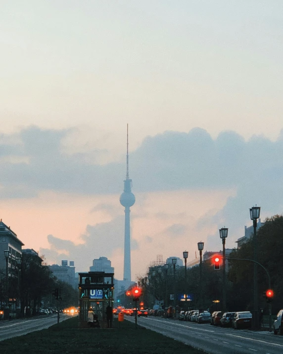 a busy road is pictured during the evening with traffic