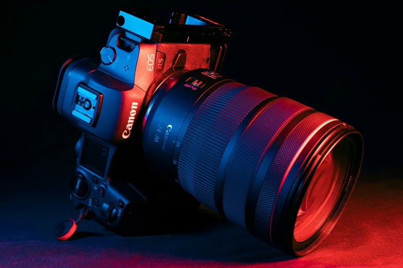 a digital camera lens with the light shining brightly on it
