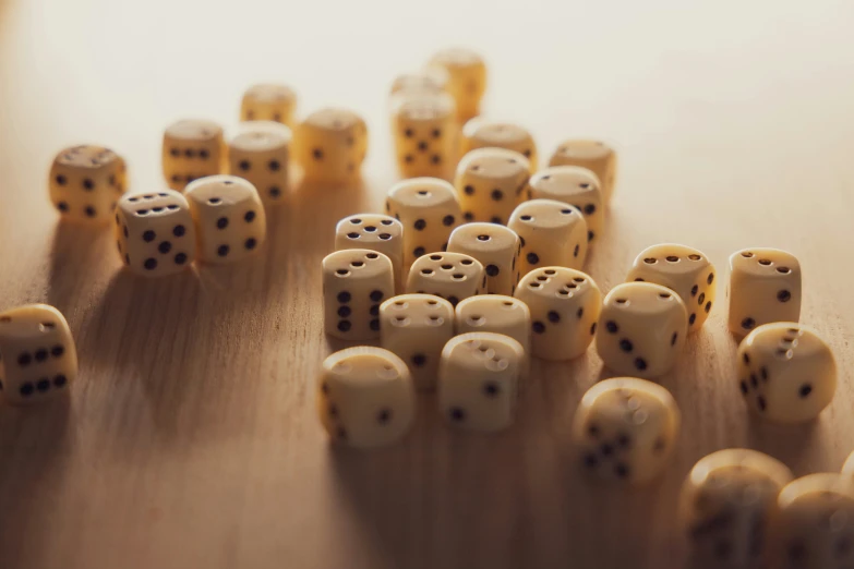 some white and black dices are on a table