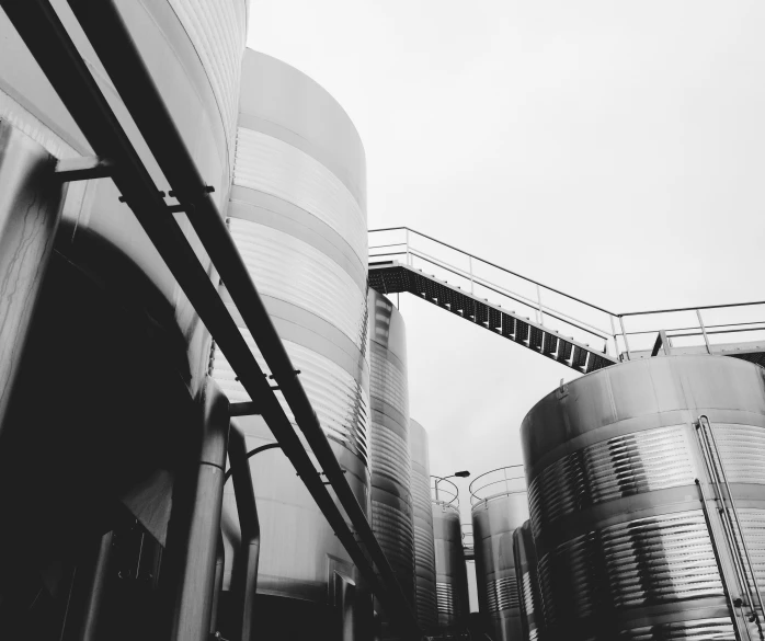 some very big steel tanks by the road